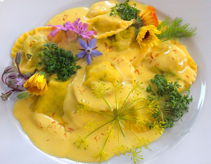 Ravioli with saffron cream sauce