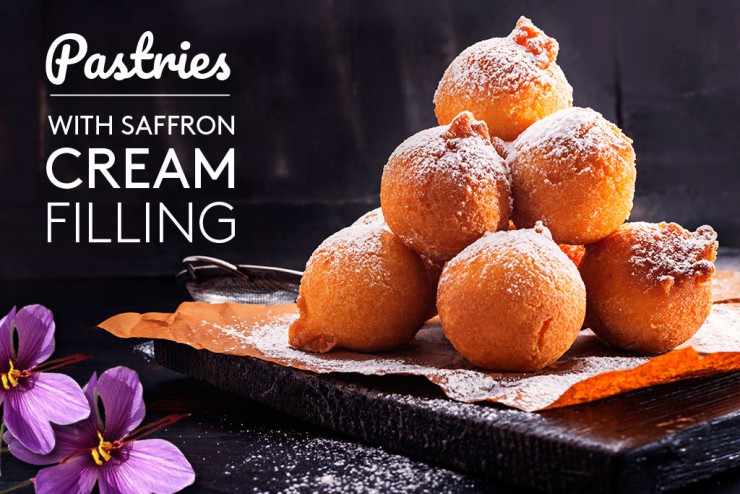 Buñuelos (pastries) with saffron cream filling