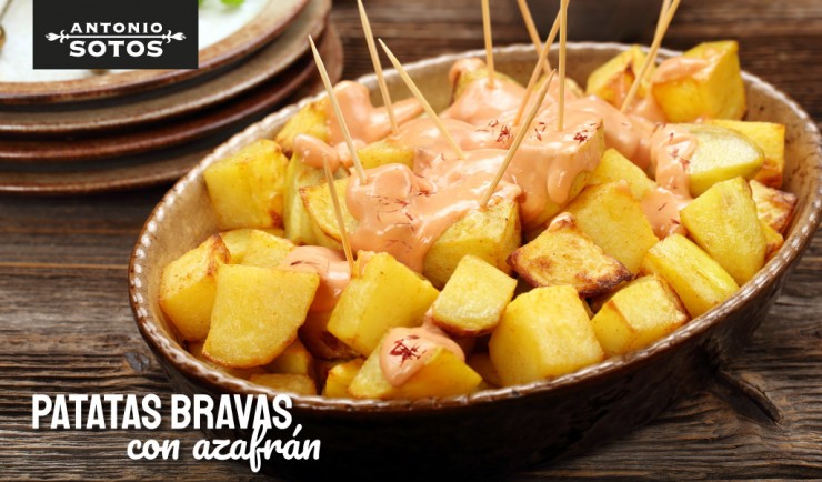 Patatas bravas con alioli de azafrán