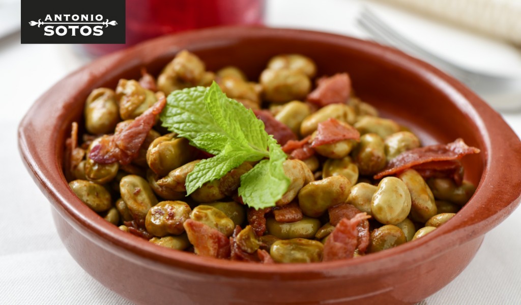 Baby broad beans with ham and saffron casserole